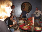   Gathering Around the Table on 
Thanksgiving
Mac's sister, Jeannie ( hostess )niece
Jeanne with baby Taylor, Marshall ,Hailey, Andy, Mac--Gavin(foreground ) 