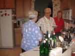  Barb Pannone, Ray Cox and Mac in the 
            kitchen