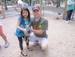 Kylee Caught a Chicken with
  Daddy's Help