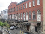  Business fronts in old buildings along
River St., as seen from a Bay Street
Stairway.