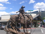  Cowboy with Child
A Good Place for Ice Cream in background -Moos